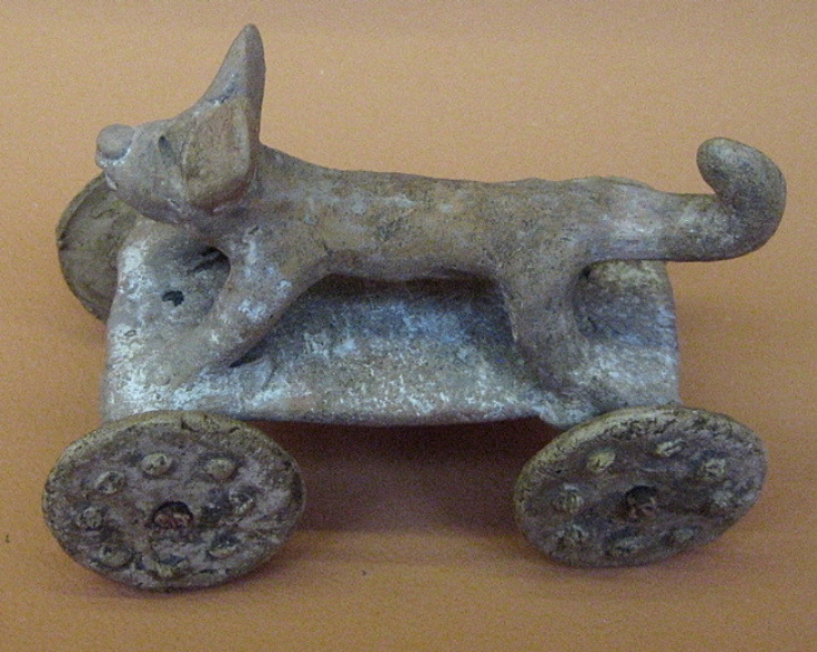 Dog on Wheeled Platform, Mexico A.D. 450-736; Sculpture, Ceramic with post-fire applied pigment. new Twist on 'Just a Walking the Dog'